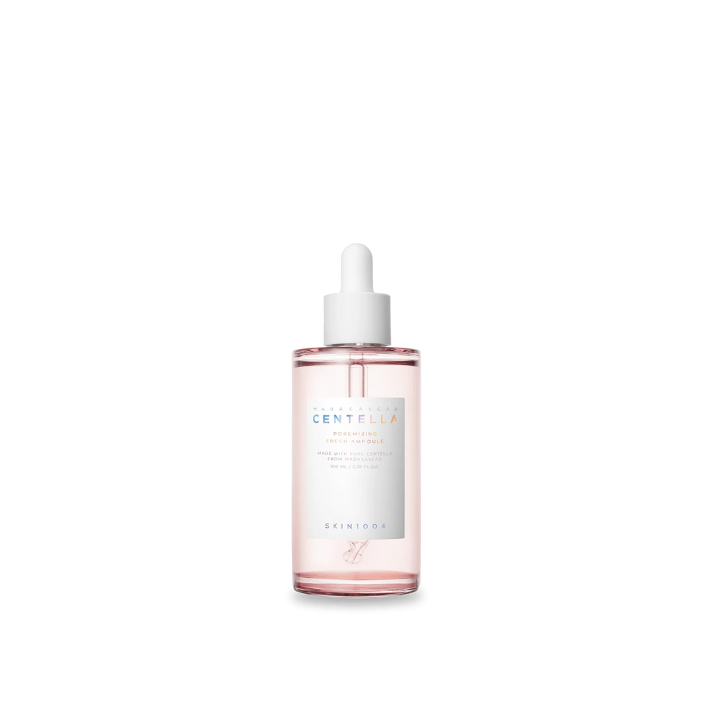 Skincare serum bottle with dropper on a white background