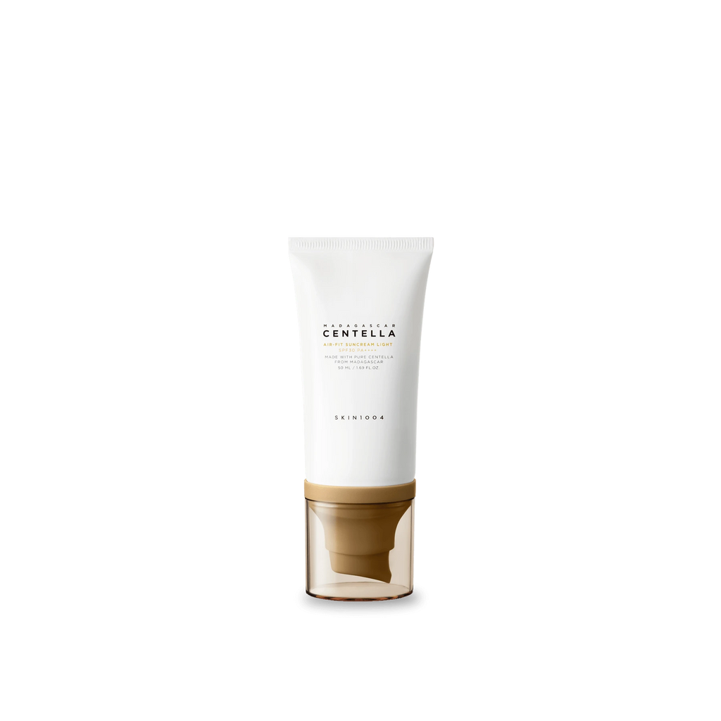 Skincare product with white container and gold base on a white background