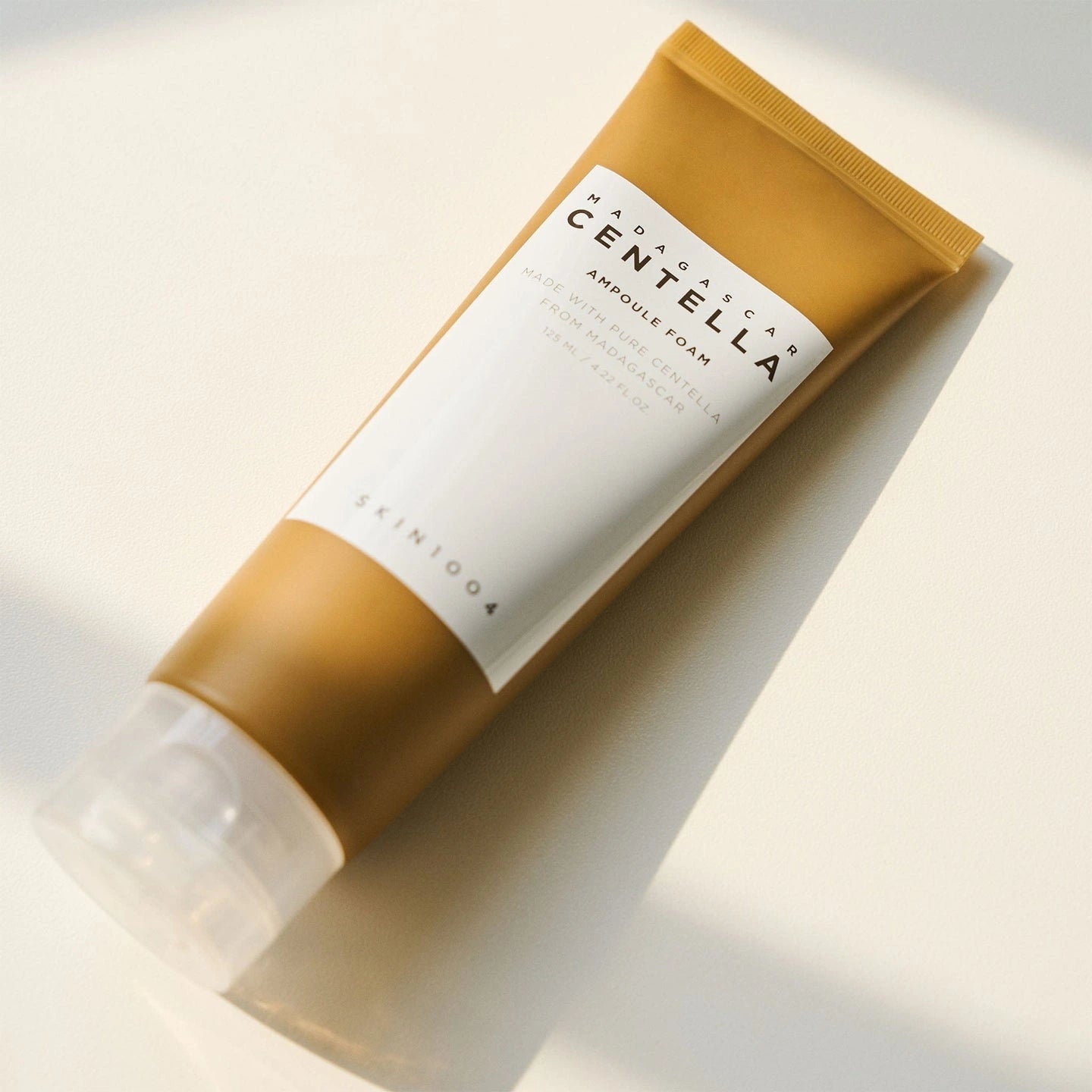 Skintoo Centella Ampoule Foam tube on a light background