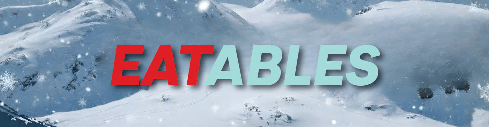 Snowy mountain landscape with 'EATABLES' text overlay