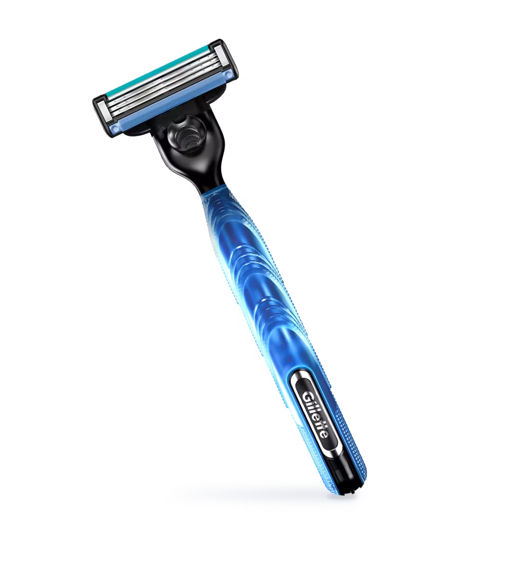A Gilde brand multi-shaver razor with a blue and black handle and a teal and silver blade, shown diagonally on a plain white background.