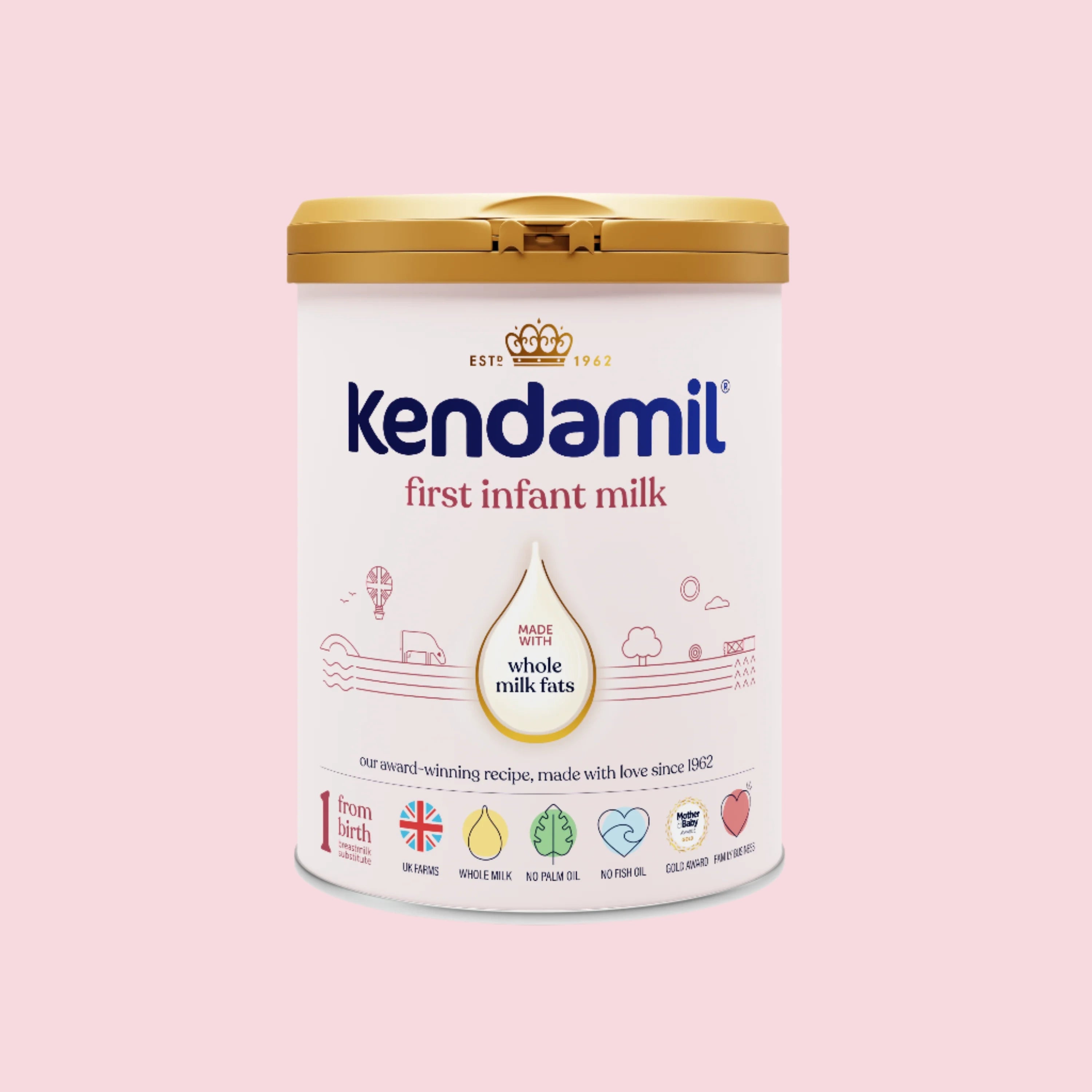Kendamil first infant milk powder can on a pink background